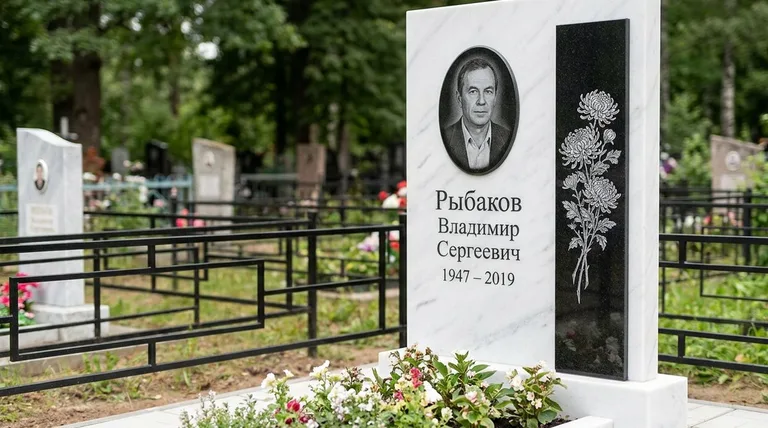 Памятник с гравировкой хризантем — выполненная работа «Рыбаков» в Омске