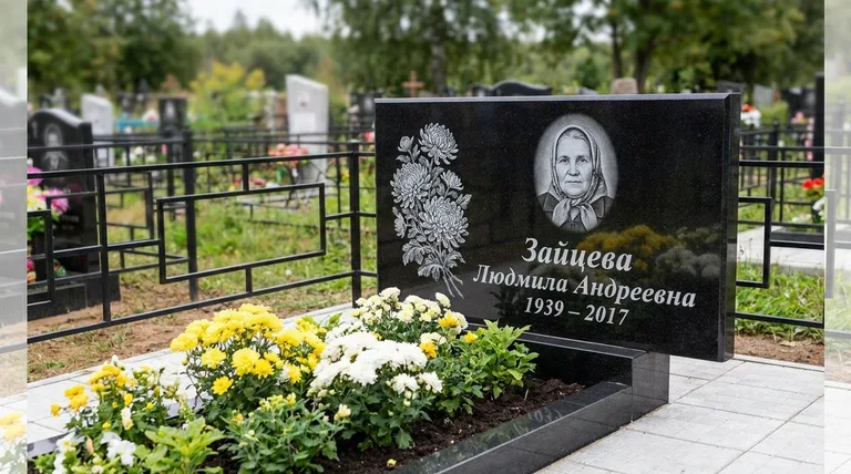 Памятник с гравировкой хризантем — выполненная работа «Зайцева» в Омске