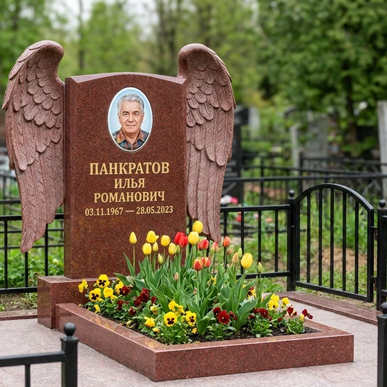 Памятник с парящими крыльями ангела из лезниковского гранита